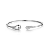 ELLE "RAINDROP" RHODIUM PLATED PAVE CZ & PUFFY HIGH POLISH PEAR SHAPE FLEXI CUFF BANGLE 6.75" AT ARMANS JEWELLERS KITCHENER WATERLOO